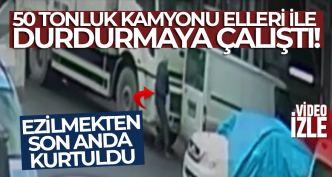 50 tonluk kamyonu elleri ile durdurmaya çalıştı, ezilmekten son anda kurtuldu