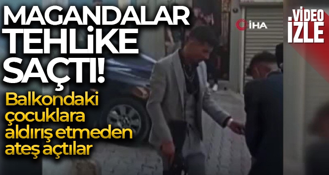 Balkondaki çocuklara aldırış etmeden ateş açan magandalar yakalandı