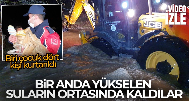 Bir anda yükselen suların ortasında kaldılar