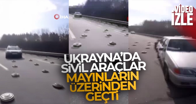 Ukrayna'da sivil araçlar yola döşenen mayınların üzerinden geçti